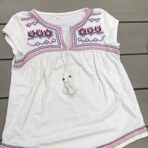 Embroidered shirt with tassels